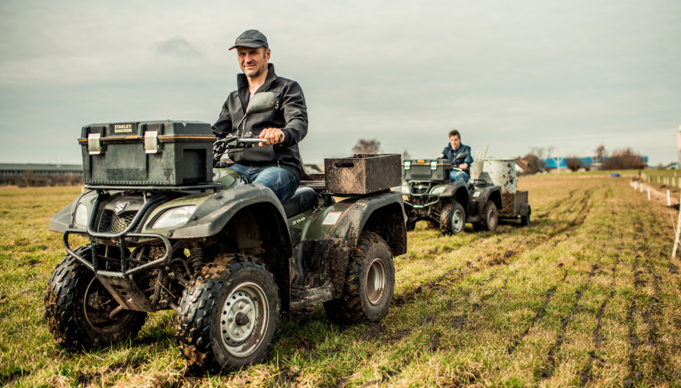 Boer op een Landbouw quad
